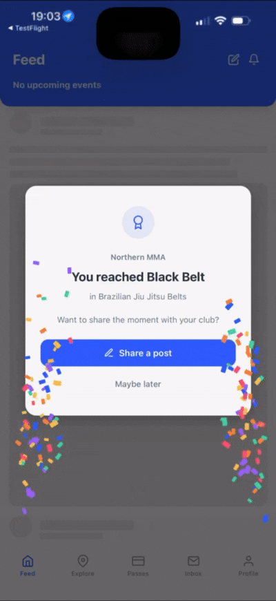 A student being congratulated on reaching a new belt level in the Dyno member app